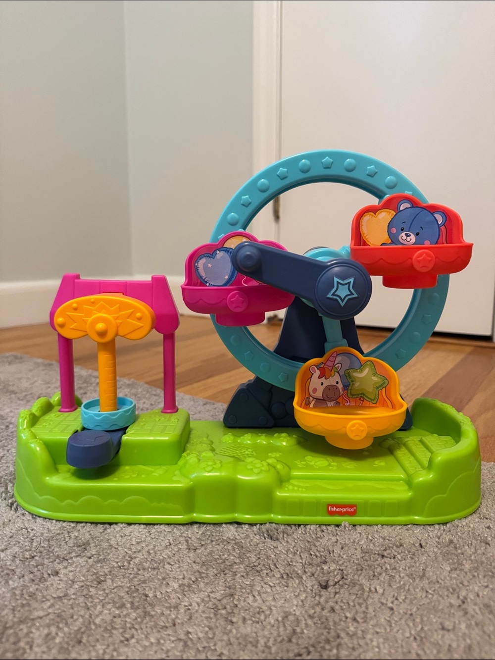 Fisher-Price Bright Teal, Pink, Orange and Red Ferris Wheel Activity Toy
